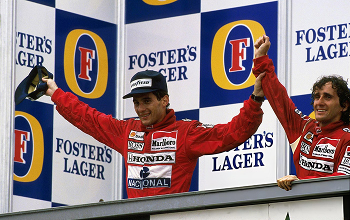 Ayrton Senna i Alain Prost na podium w barwach McLarena w sezonie 1988